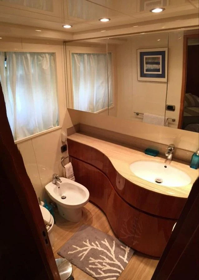 a bathroom with a sink and a toilet aboard YAIZA Yacht for Sale