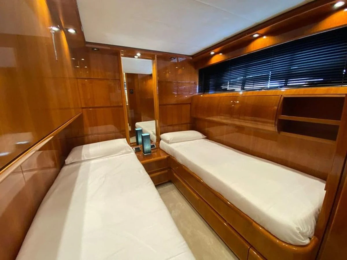 a room with two beds aboard YAIZA Yacht for Sale