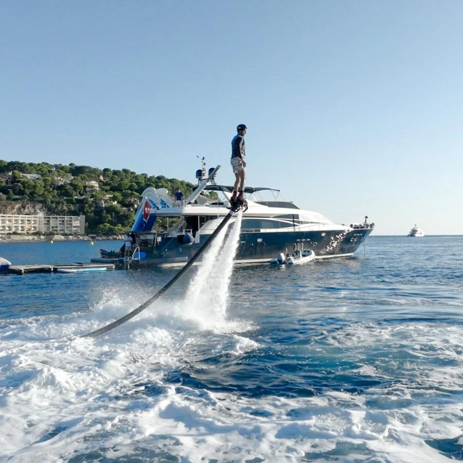 a man standing on a boat aboard LADY AMANDA Yacht for Sale