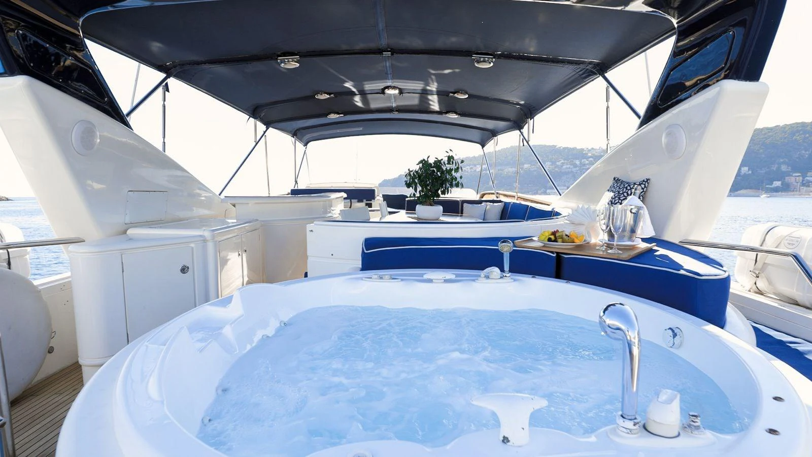 a boat with a blue roof aboard LADY AMANDA Yacht for Sale