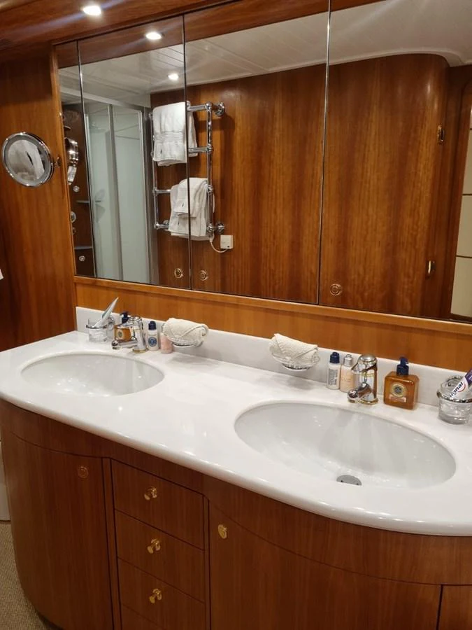 a bathroom with two sinks aboard LADY AMANDA Yacht for Sale