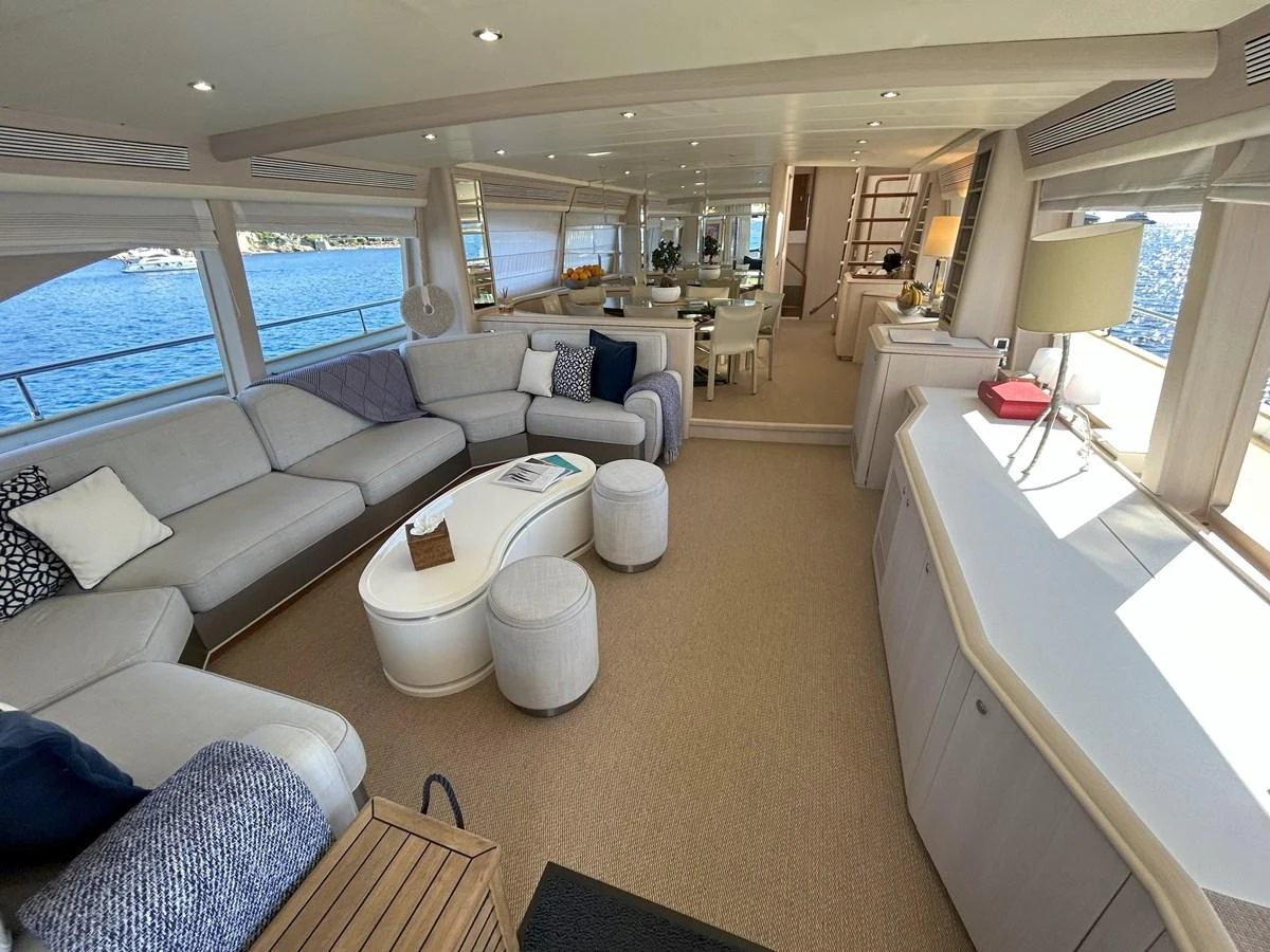 a living room with a large window aboard LADY AMANDA Yacht for Sale