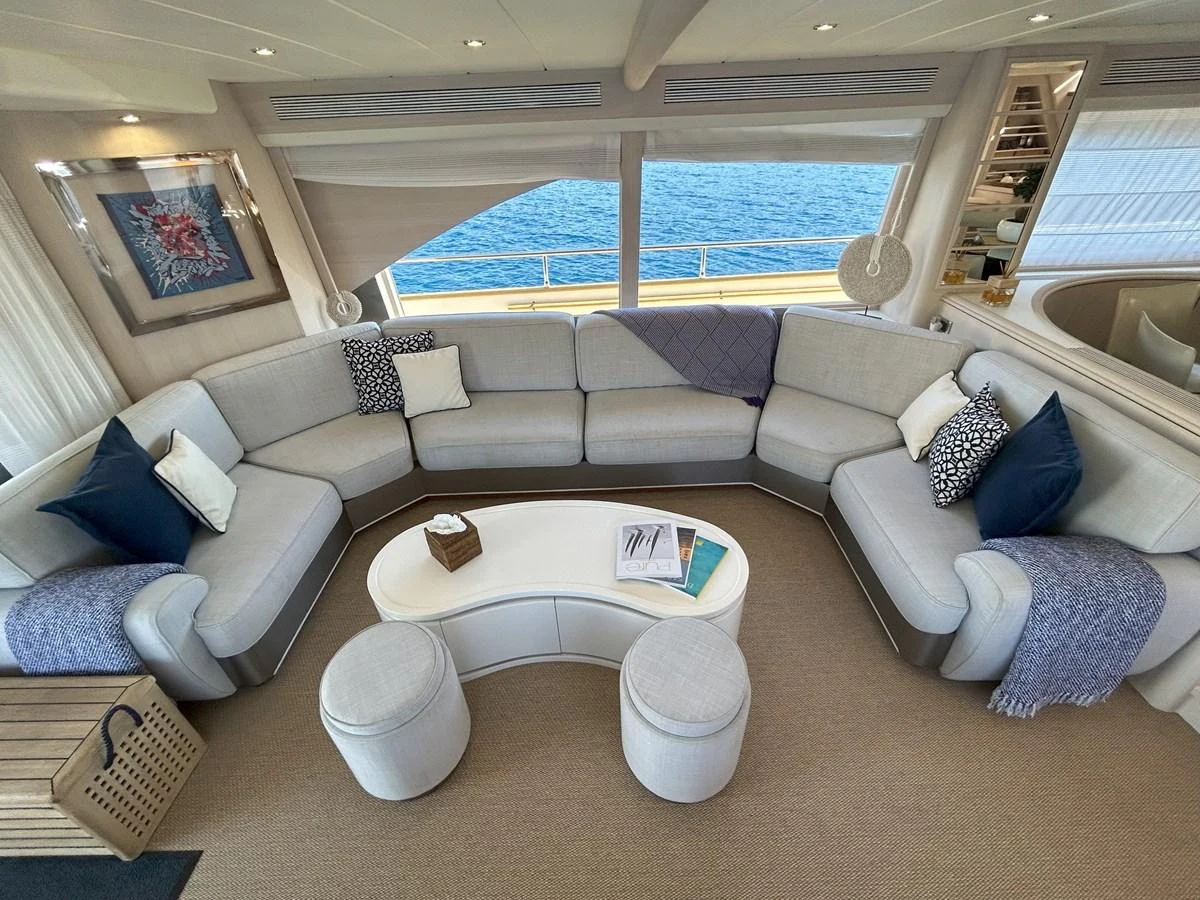 a living room with a large window aboard LADY AMANDA Yacht for Sale