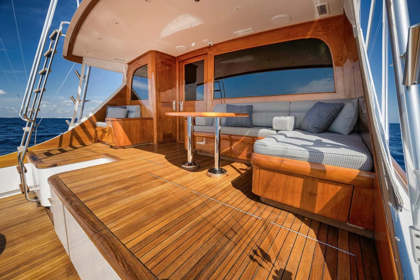 The aft deck features luxurious seating and a polished wooden finish, perfect for relaxation and socializing. aboard BREE Yacht for Sale