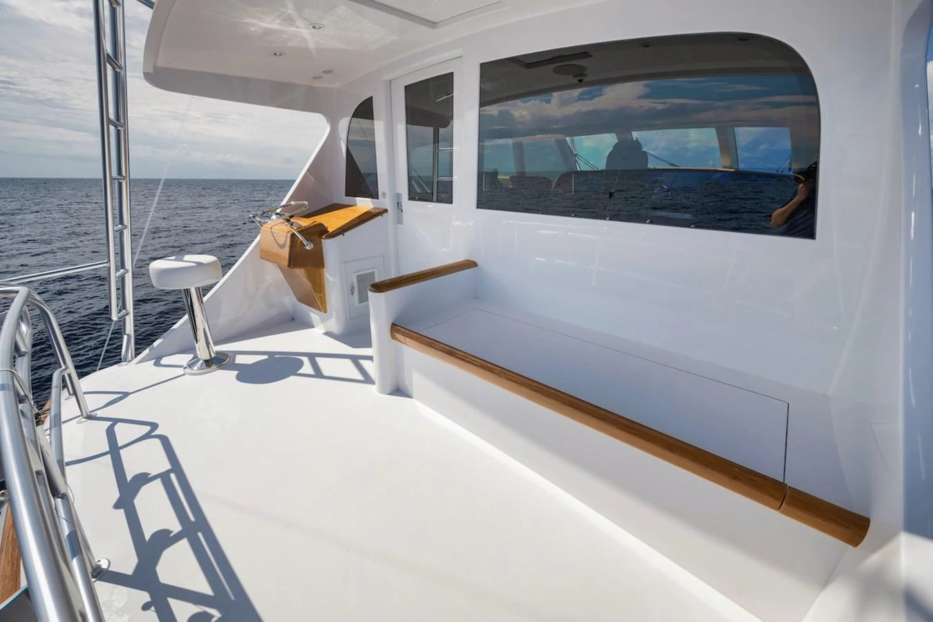 The aft deck offers a spacious and serene area for relaxation with stunning ocean views. aboard BREE Yacht for Sale
