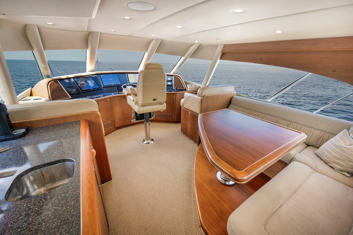 The helm area offers a luxurious and spacious environment with panoramic views of the sea. aboard BREE Yacht for Sale