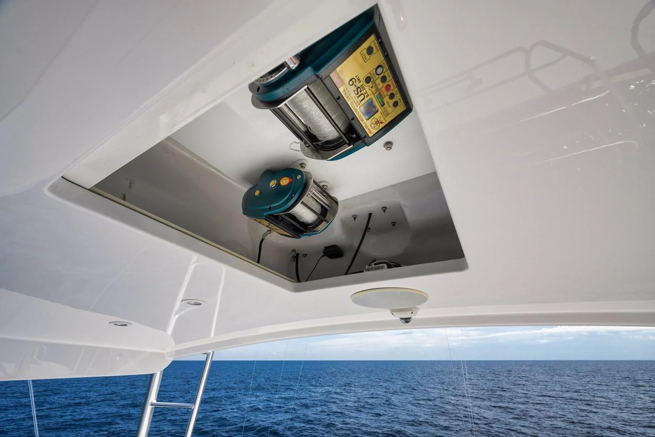 The image captures a detailed view of the yacht's fishing equipment mounted on the ceiling. aboard BREE Yacht for Sale