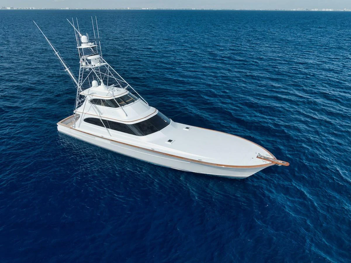 A sleek yacht glides effortlessly over the deep blue sea, showcasing its elegant design and pristine condition. aboard BREE Yacht for Sale