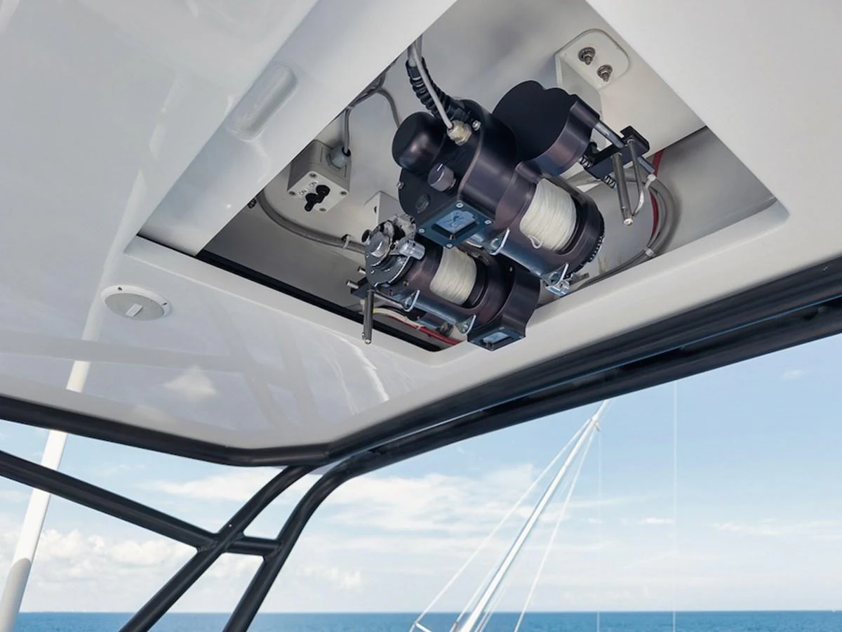 A detailed view of the yacht's overhead fishing reel system, showcasing its advanced equipment. aboard BREE Yacht for Sale