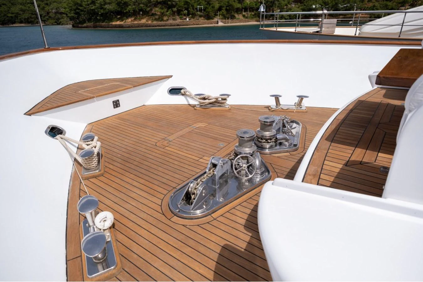 The foredeck showcases polished stainless steel fittings and a well-maintained teak deck. aboard PARSLEY Yacht for Sale