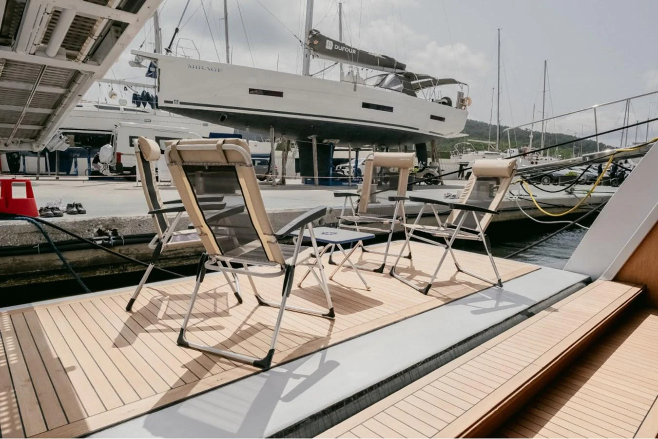 The swim platform features comfortable lounge chairs, perfect for relaxation by the water. aboard PARSLEY Yacht for Sale