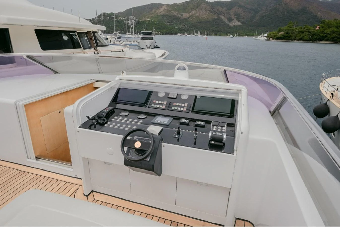 The helm station offers a sophisticated control center with advanced navigation equipment. aboard PARSLEY Yacht for Sale