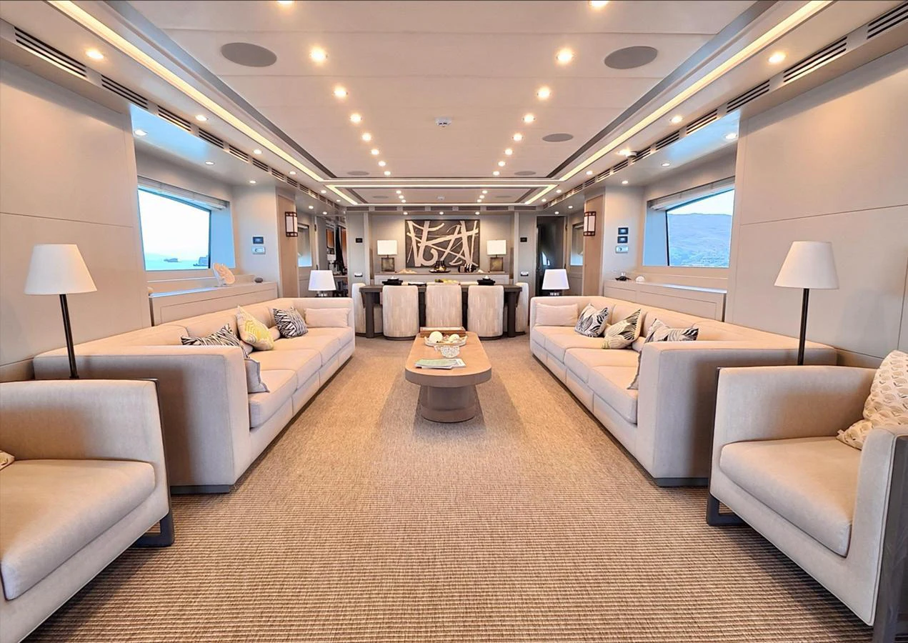 The salon features plush seating and elegant decor, creating a luxurious and inviting atmosphere. aboard RIVA 115 Yacht for Sale