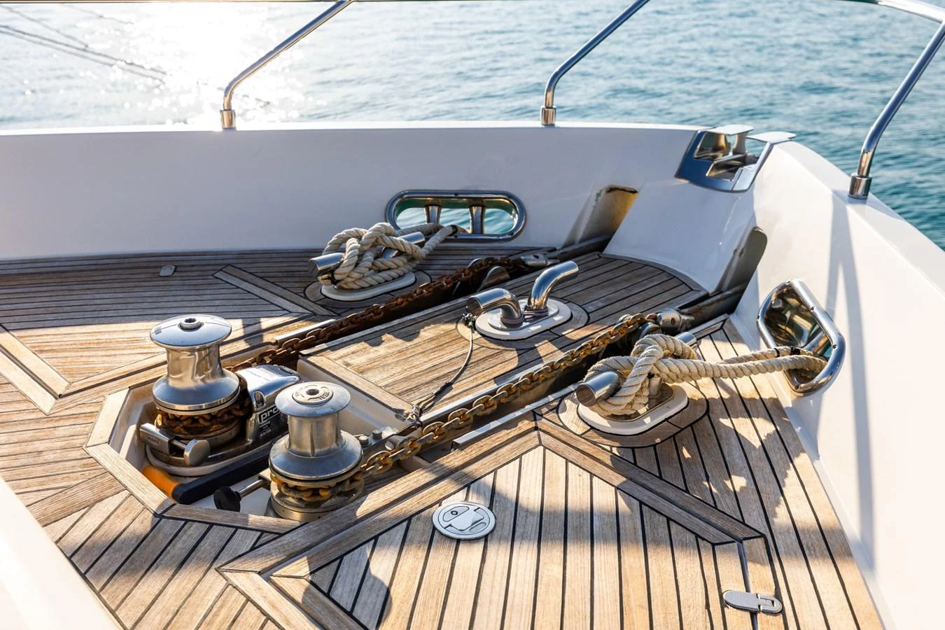 The foredeck features polished winches and neatly coiled ropes, showcasing the yacht's attention to detail and quality craftsmanship. aboard PUMABAY Yacht for Sale