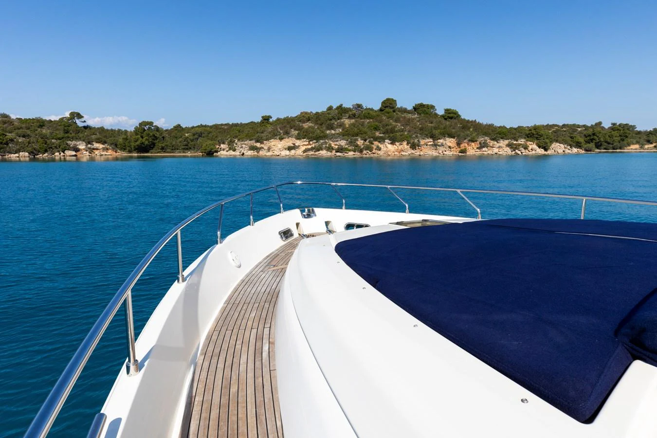 The yacht's foredeck offers a spacious sunbathing area with stunning views of the surrounding waters and landscape. aboard PUMABAY Yacht for Sale