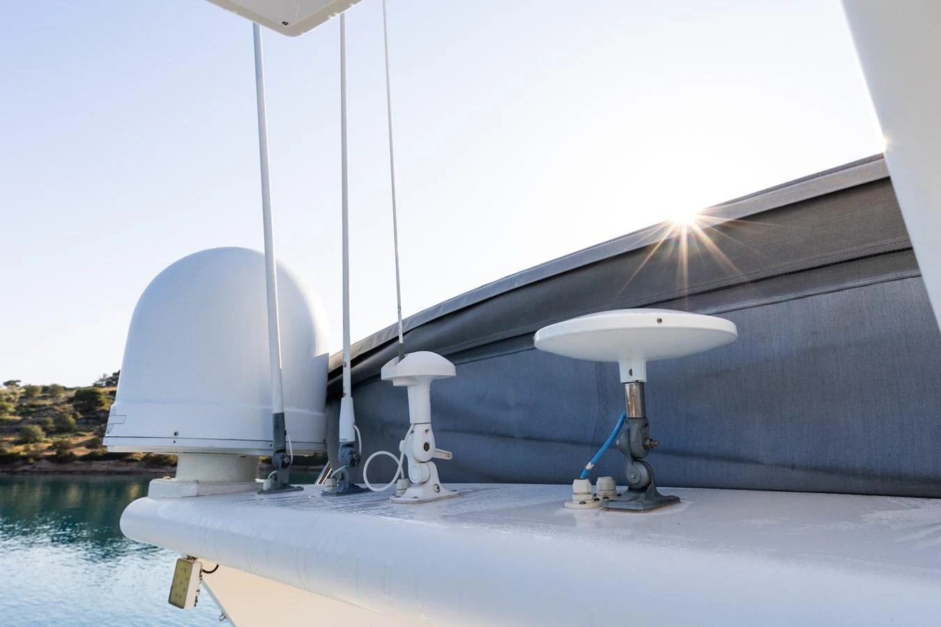 A close-up view of the yacht's communication and navigation equipment on a sunny day. aboard PUMABAY Yacht for Sale
