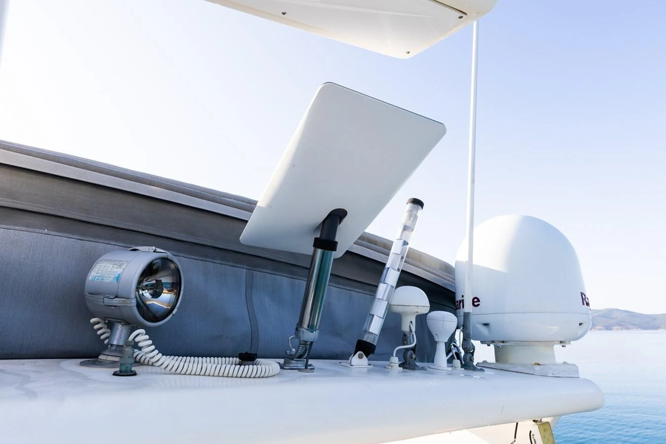 A close-up view of the yacht's communication and navigation equipment on the deck. aboard PUMABAY Yacht for Sale