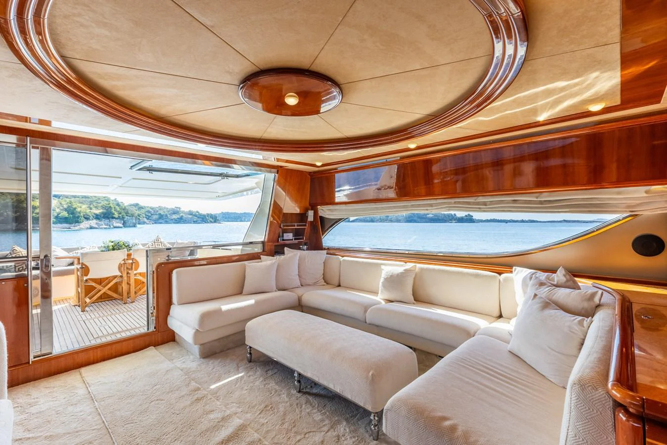 The salon offers a luxurious and spacious seating area with panoramic views of the water. aboard PUMABAY Yacht for Sale