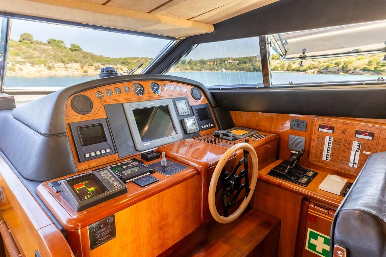 The yacht's helm features a sophisticated array of navigation instruments and controls. aboard PUMABAY Yacht for Sale