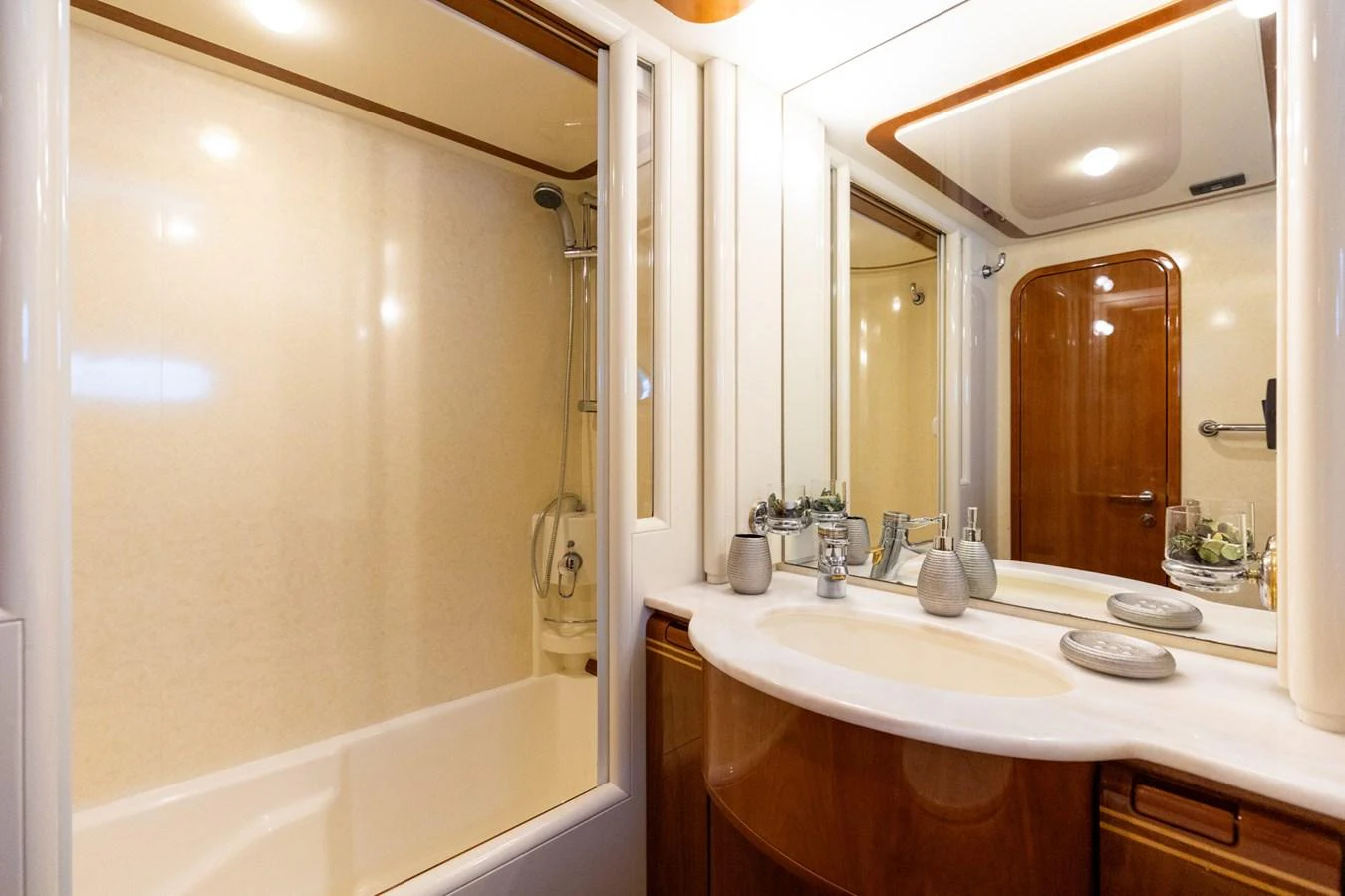 The yacht's bathroom features a sleek vanity and a spacious shower area. aboard PUMABAY Yacht for Sale