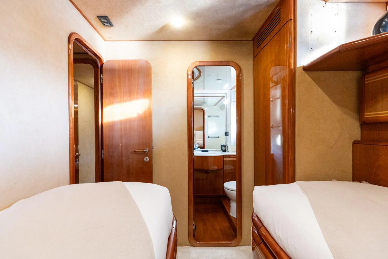 The guest stateroom features twin beds and a private ensuite bathroom. aboard PUMABAY Yacht for Sale