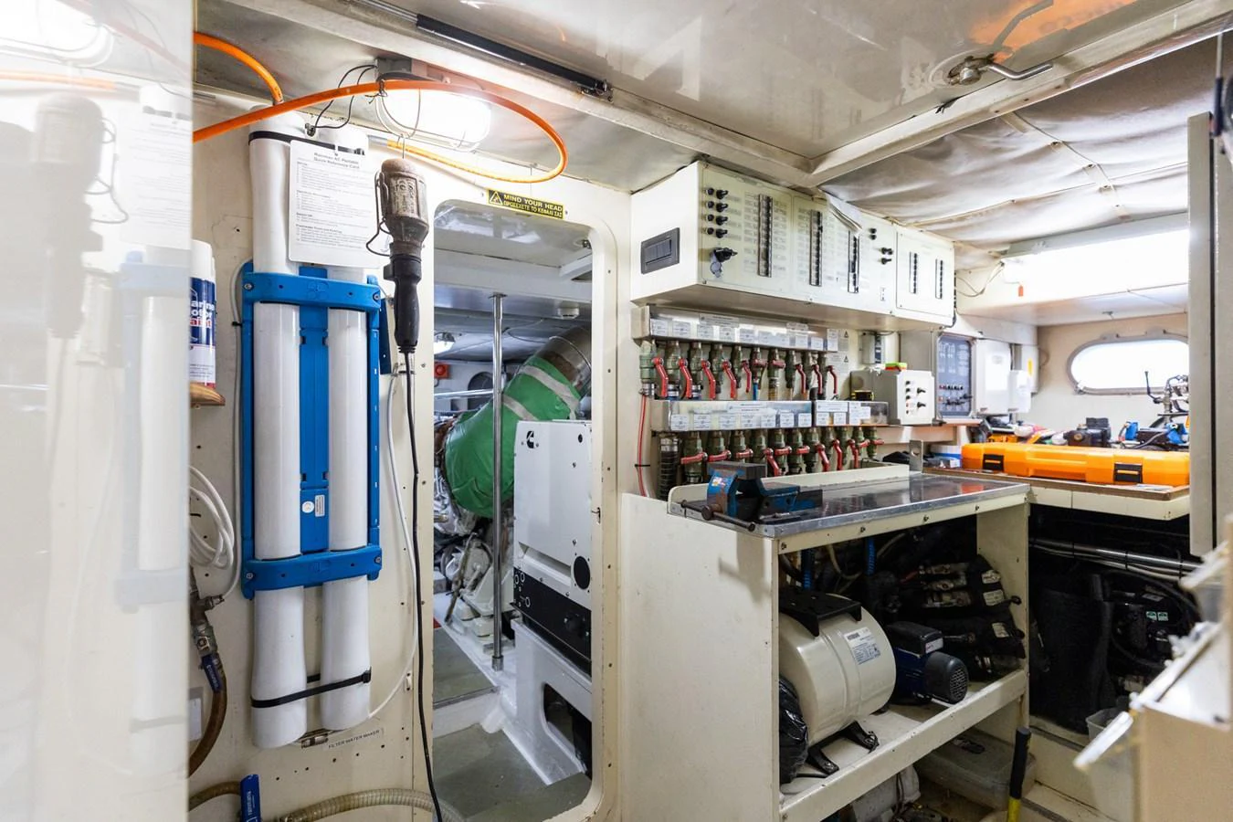 The image showcases the well-organized engine room of the yacht, featuring various technical equipment and control panels. aboard PUMABAY Yacht for Sale