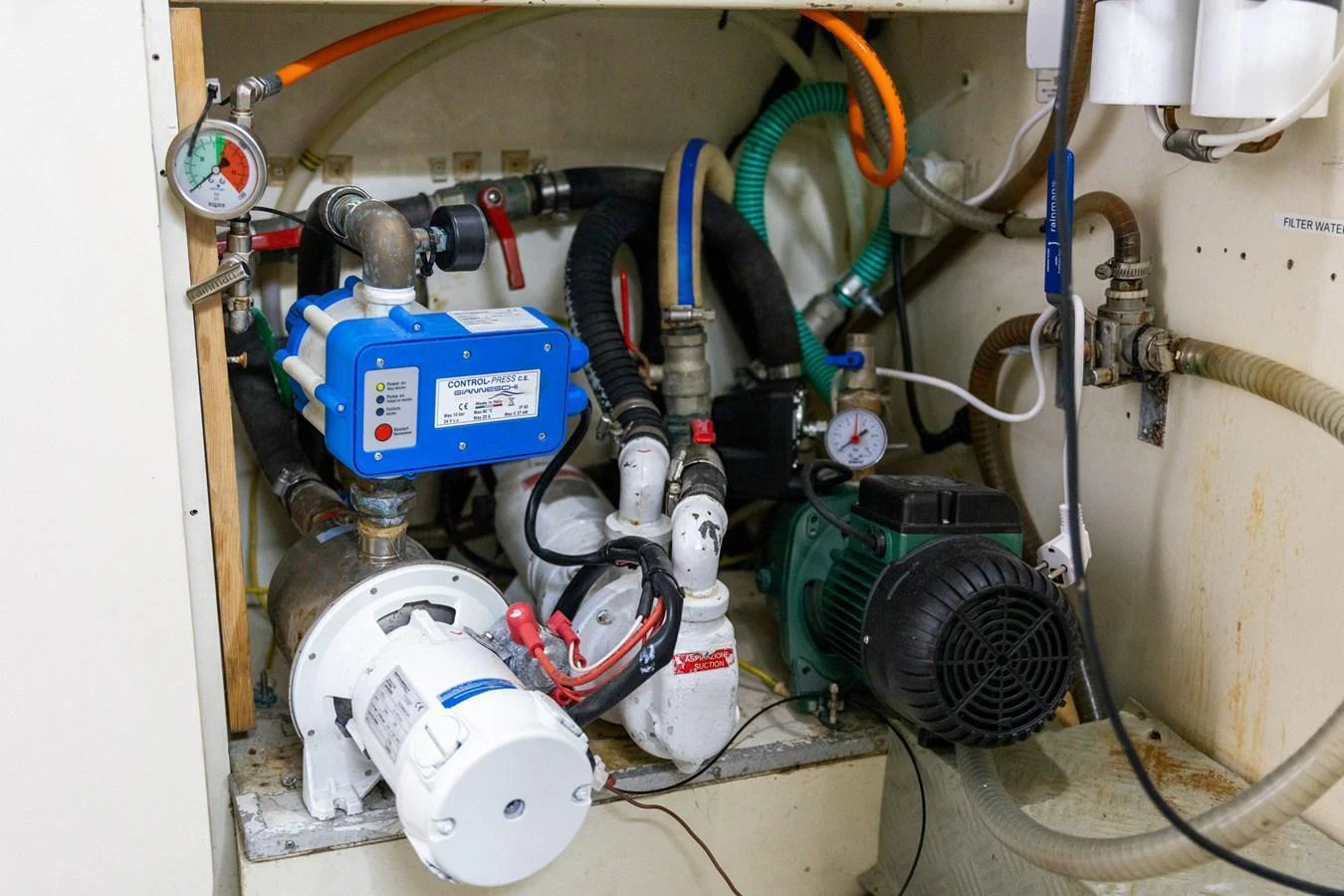 The image showcases the intricate machinery and plumbing within the yacht's engine room. aboard PUMABAY Yacht for Sale