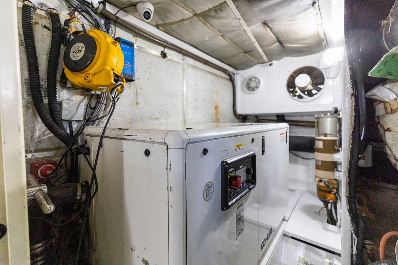 The image showcases the yacht's engine room with visible machinery and equipment. aboard PUMABAY Yacht for Sale