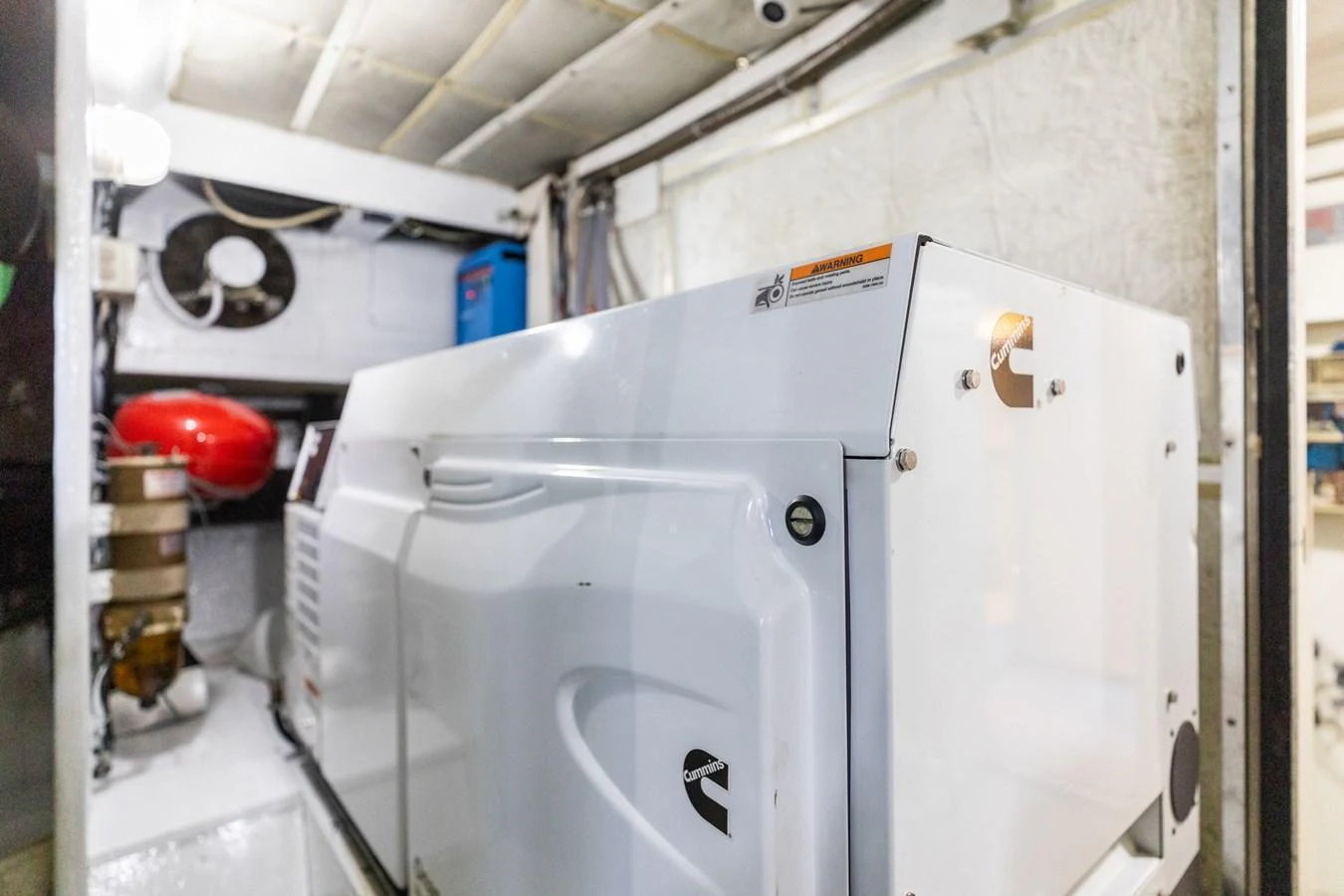 The image showcases the engine room with a focus on the machinery and equipment. aboard PUMABAY Yacht for Sale