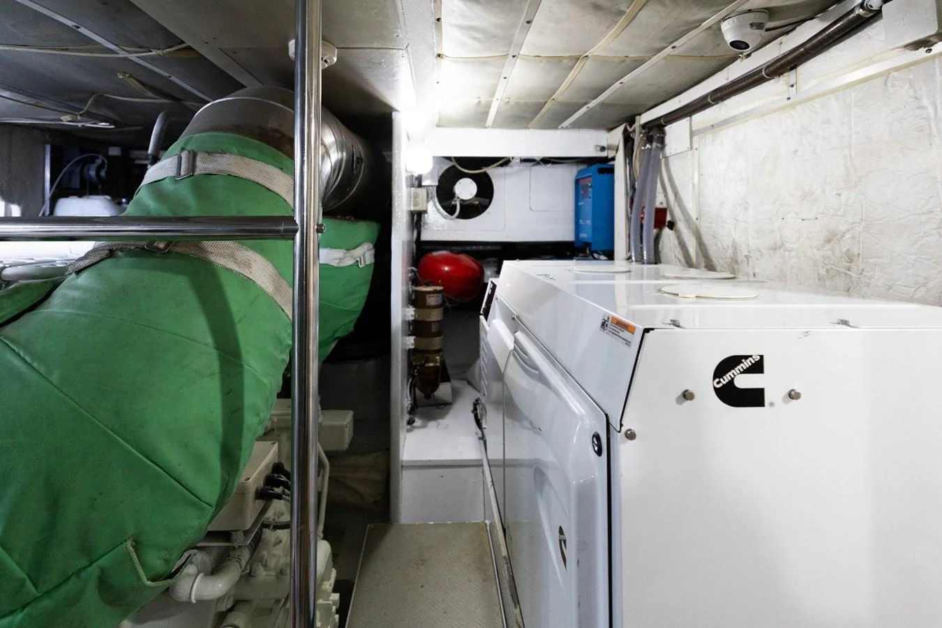 The image showcases the yacht's engine room with visible machinery and equipment. aboard PUMABAY Yacht for Sale