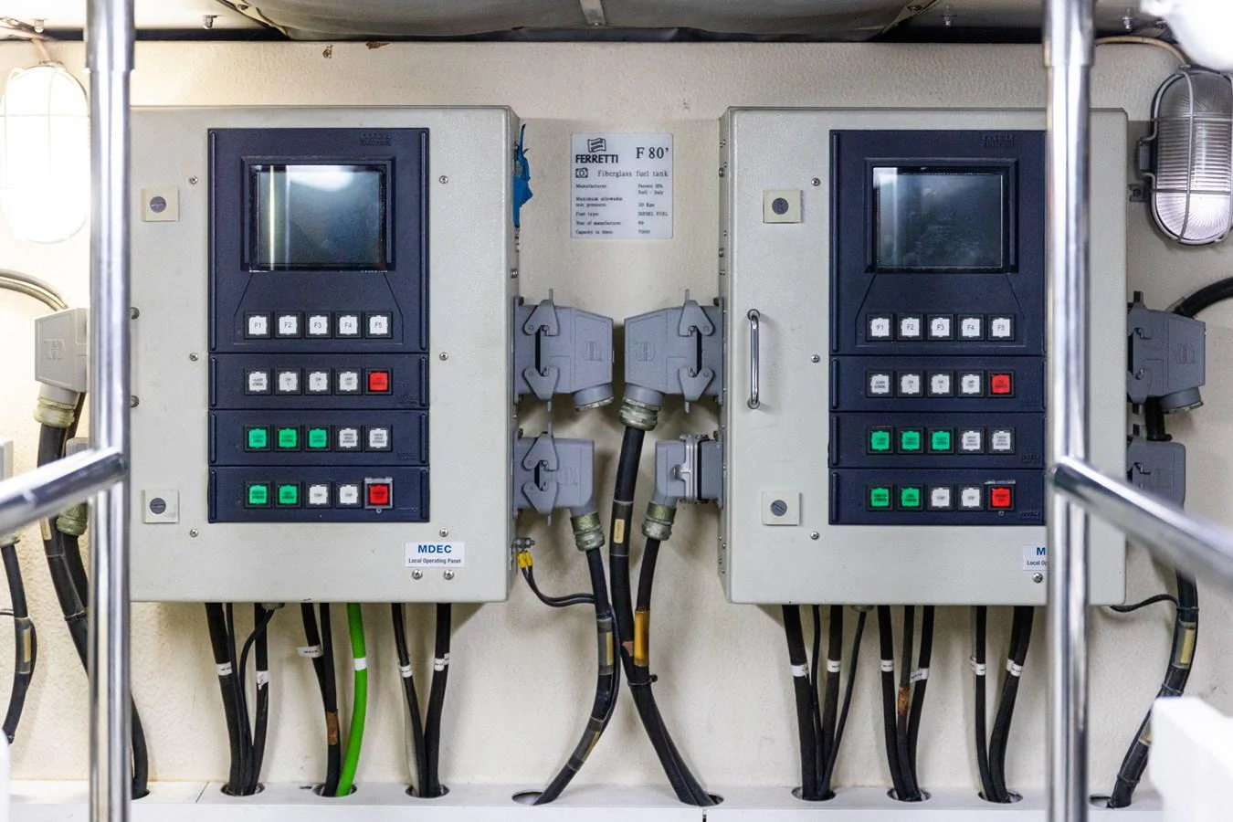 The image shows the control panels and electrical systems of the yacht. aboard PUMABAY Yacht for Sale