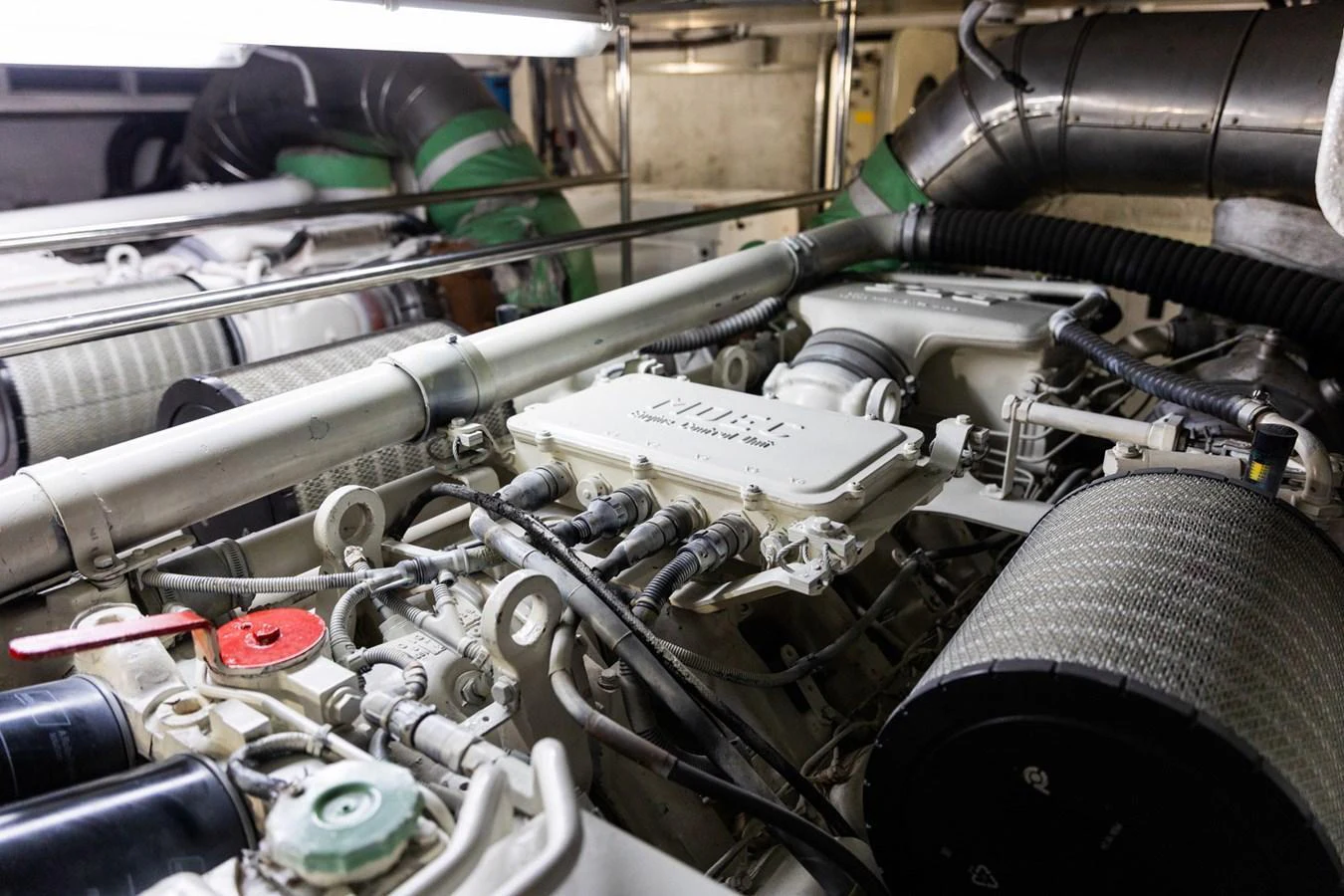 The image showcases the intricate and well-maintained engine room of the yacht. aboard PUMABAY Yacht for Sale