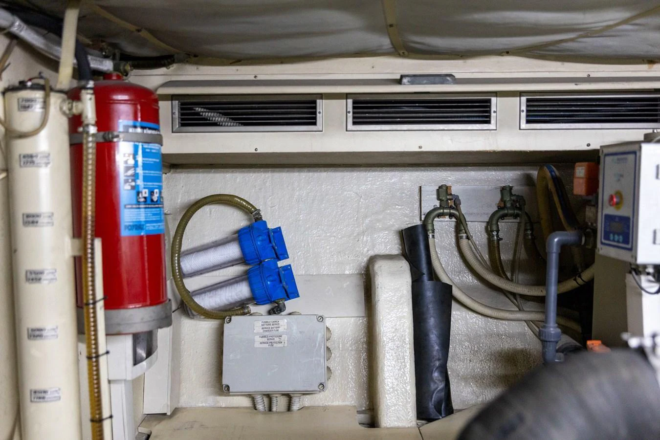 A detailed view of the yacht's engine room showcasing essential safety and operational equipment. aboard PUMABAY Yacht for Sale