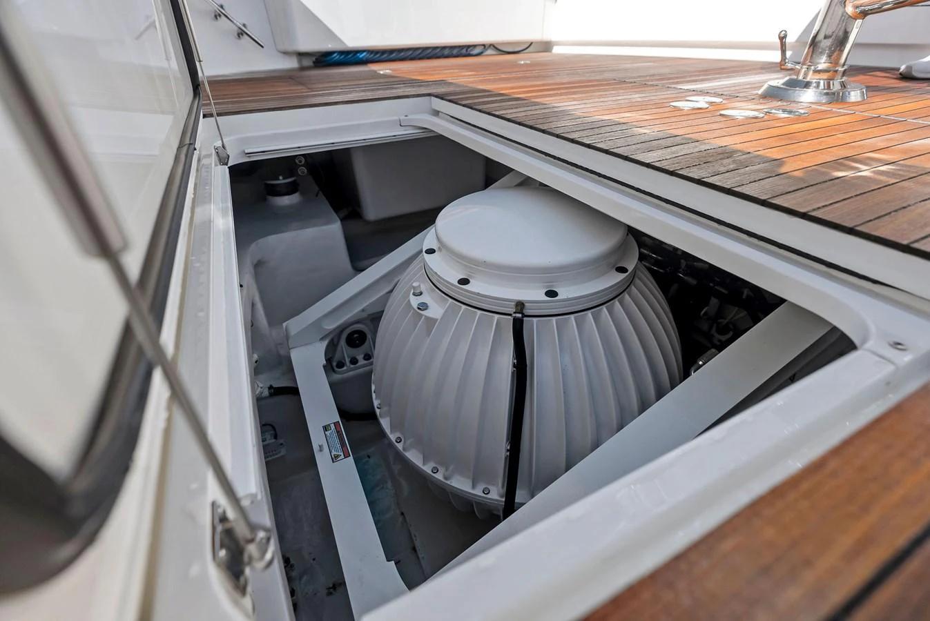 The image showcases a detailed view of the yacht's stabilizer system beneath the deck. aboard CATCH 23 Yacht for Sale