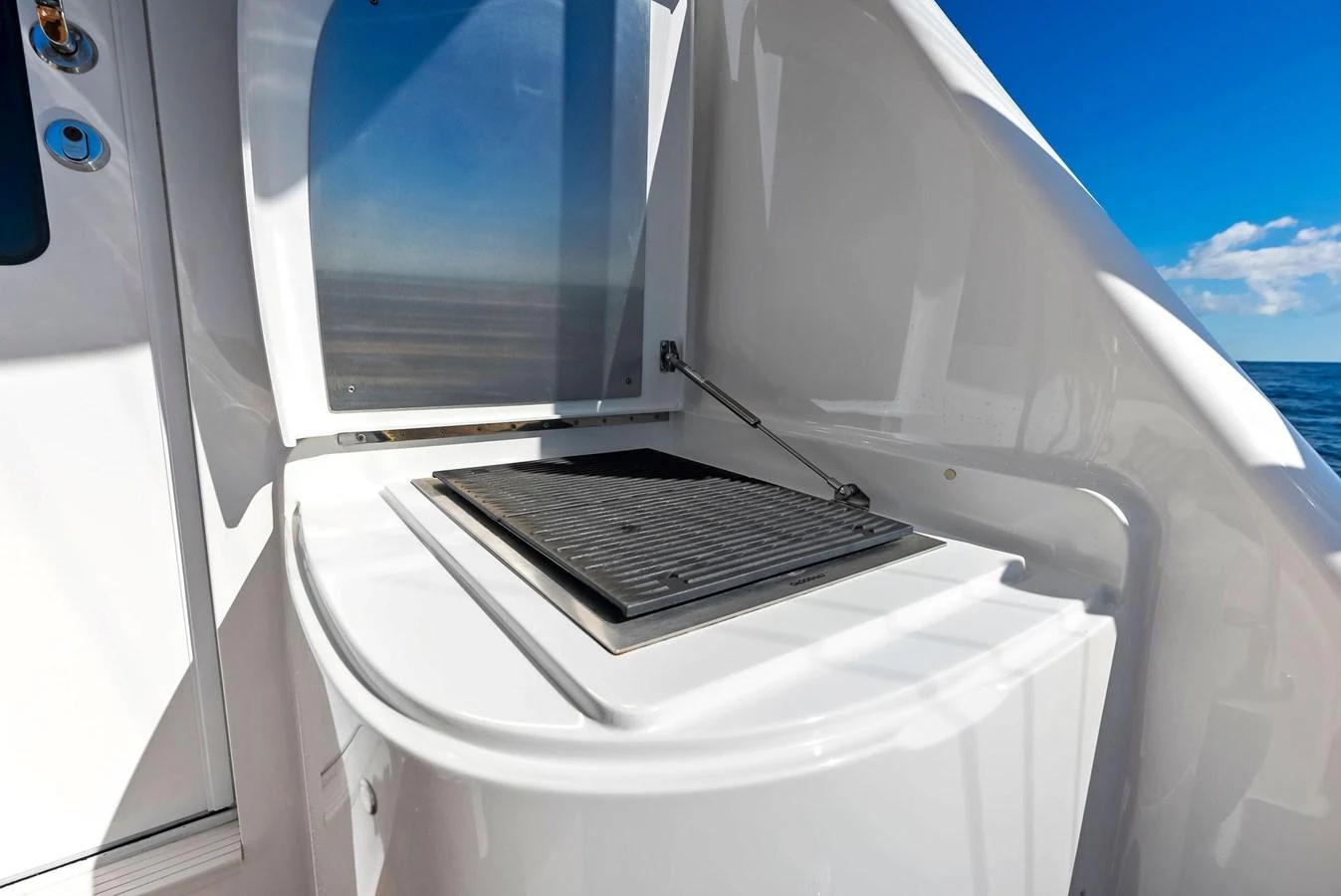 A sleek outdoor grilling station on the yacht, perfect for alfresco dining. aboard CATCH 23 Yacht for Sale