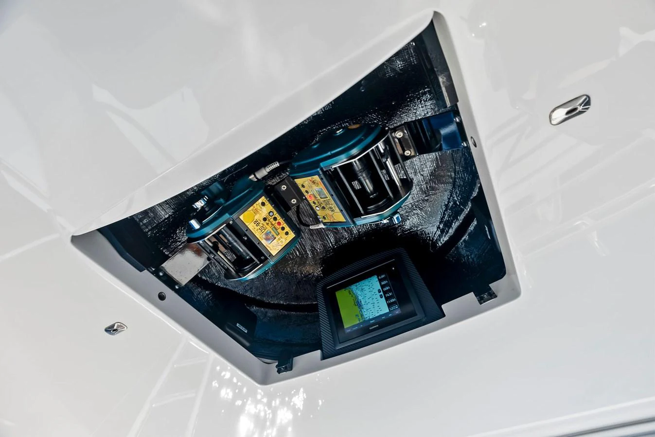 A close-up view of the yacht's advanced control panel and electronic systems. aboard CATCH 23 Yacht for Sale