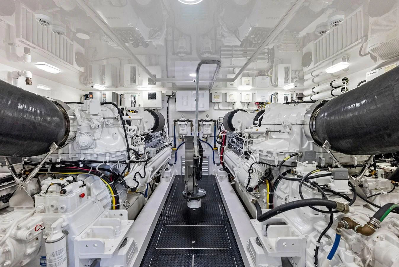 The engine room showcases the powerful machinery and pristine maintenance of the yacht. aboard CATCH 23 Yacht for Sale