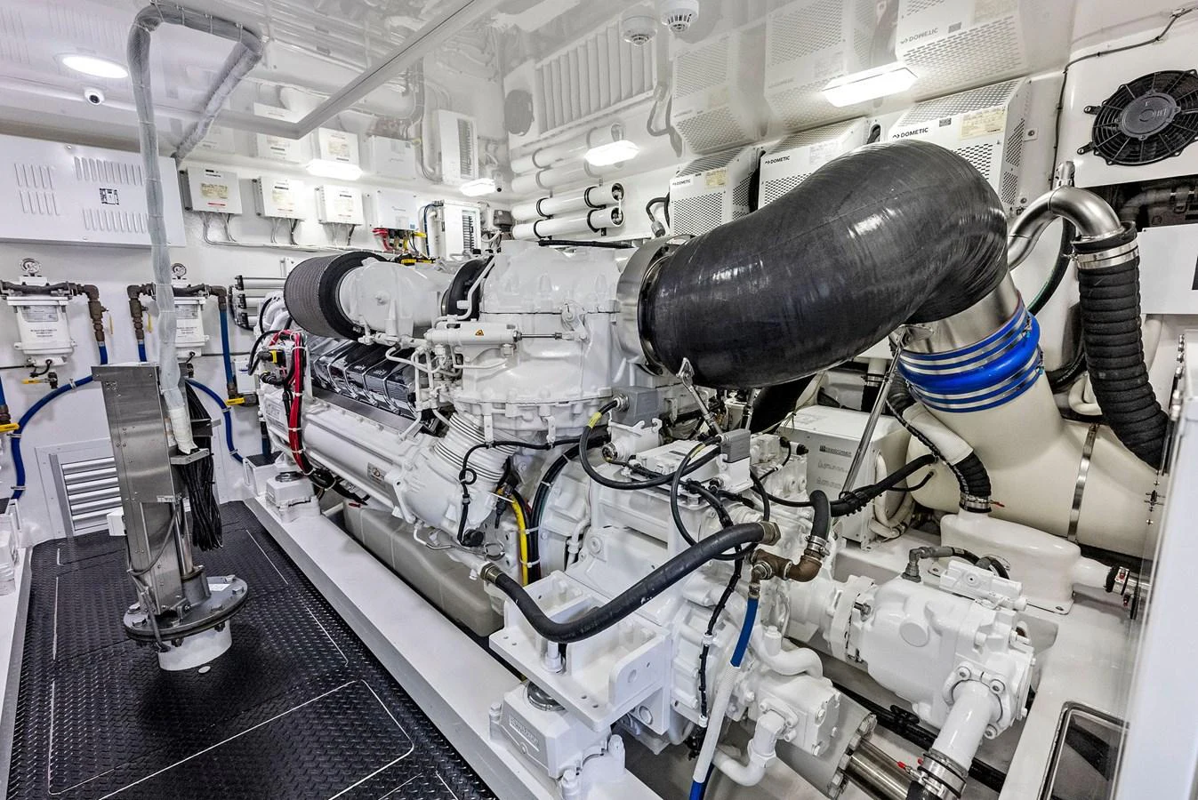 The image showcases a pristine and well-organized engine room with advanced machinery and equipment. aboard CATCH 23 Yacht for Sale