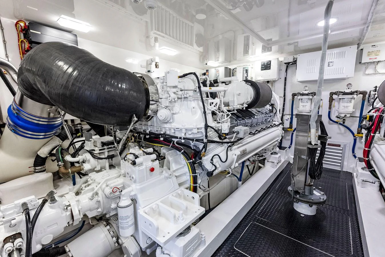 The image showcases the pristine and well-organized engine room of the yacht. aboard CATCH 23 Yacht for Sale