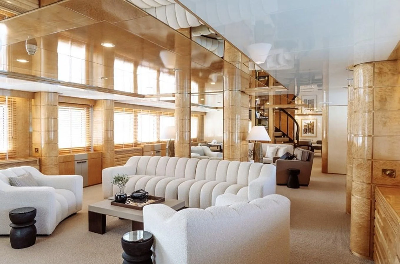 The salon features plush seating and elegant decor, creating a luxurious and inviting atmosphere. aboard KASSANDRA Yacht for Sale