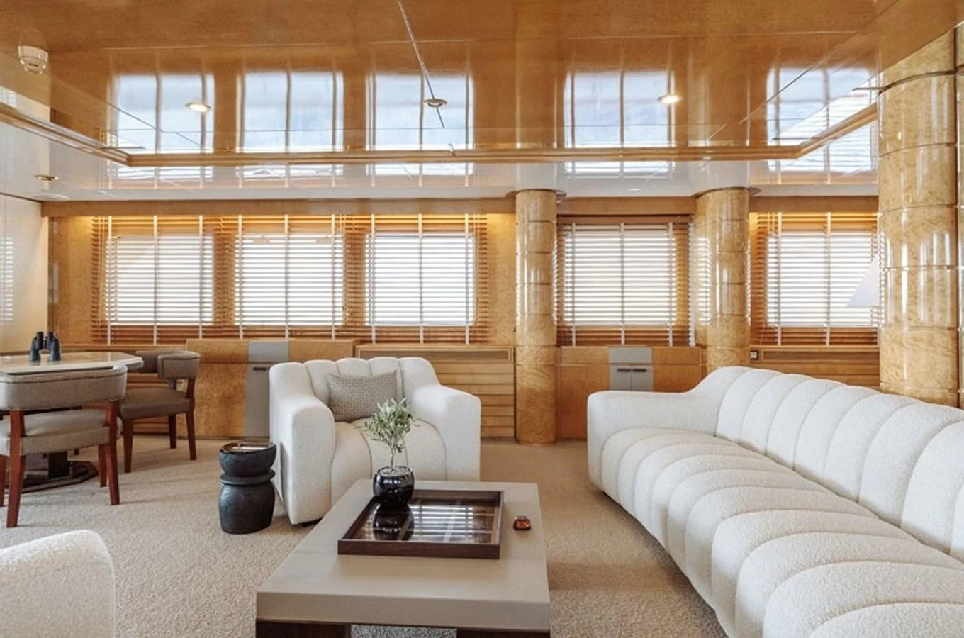 The salon features plush seating and elegant decor, creating a luxurious and inviting atmosphere. aboard KASSANDRA Yacht for Sale