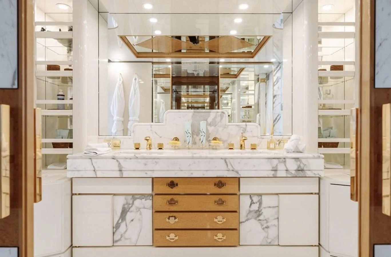 The yacht's bathroom features luxurious marble finishes and elegant fixtures. aboard KASSANDRA Yacht for Sale