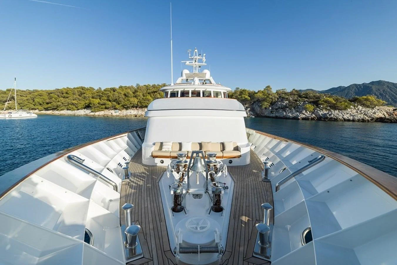The yacht's bow offers a spacious and elegant area with a clear view of the surrounding waters and landscape. aboard KASSANDRA Yacht for Sale