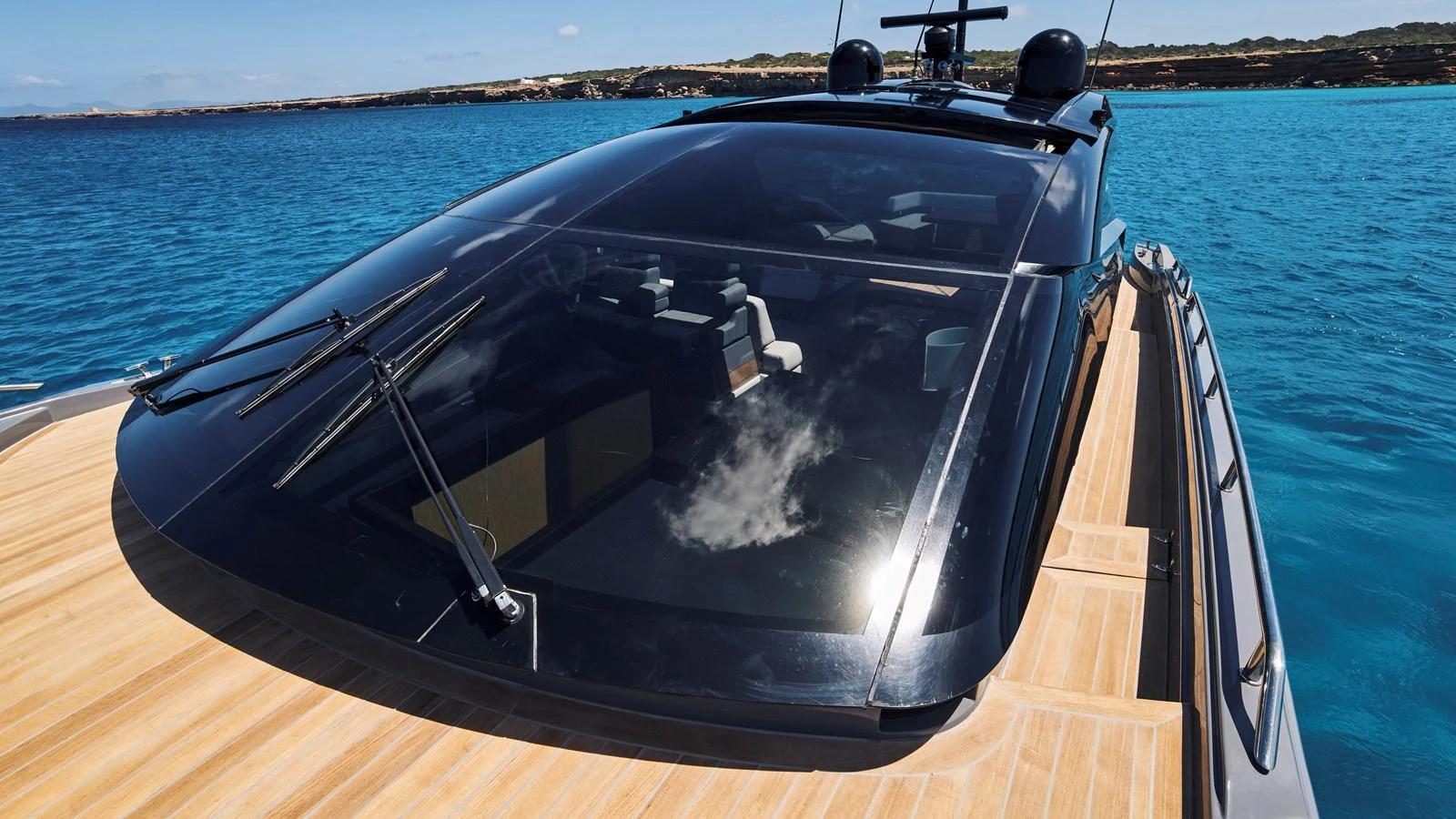 The sleek exterior of the yacht showcases its modern design and expansive deck space. aboard BAIA 70 Yacht for Sale