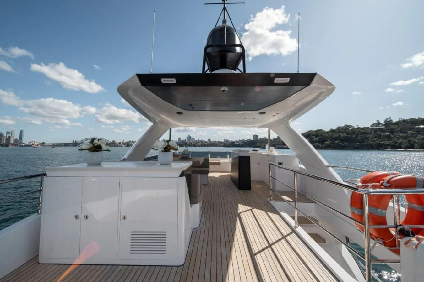 The flybridge offers a spacious and stylish outdoor area with stunning views. aboard TOPAZ Yacht for Sale
