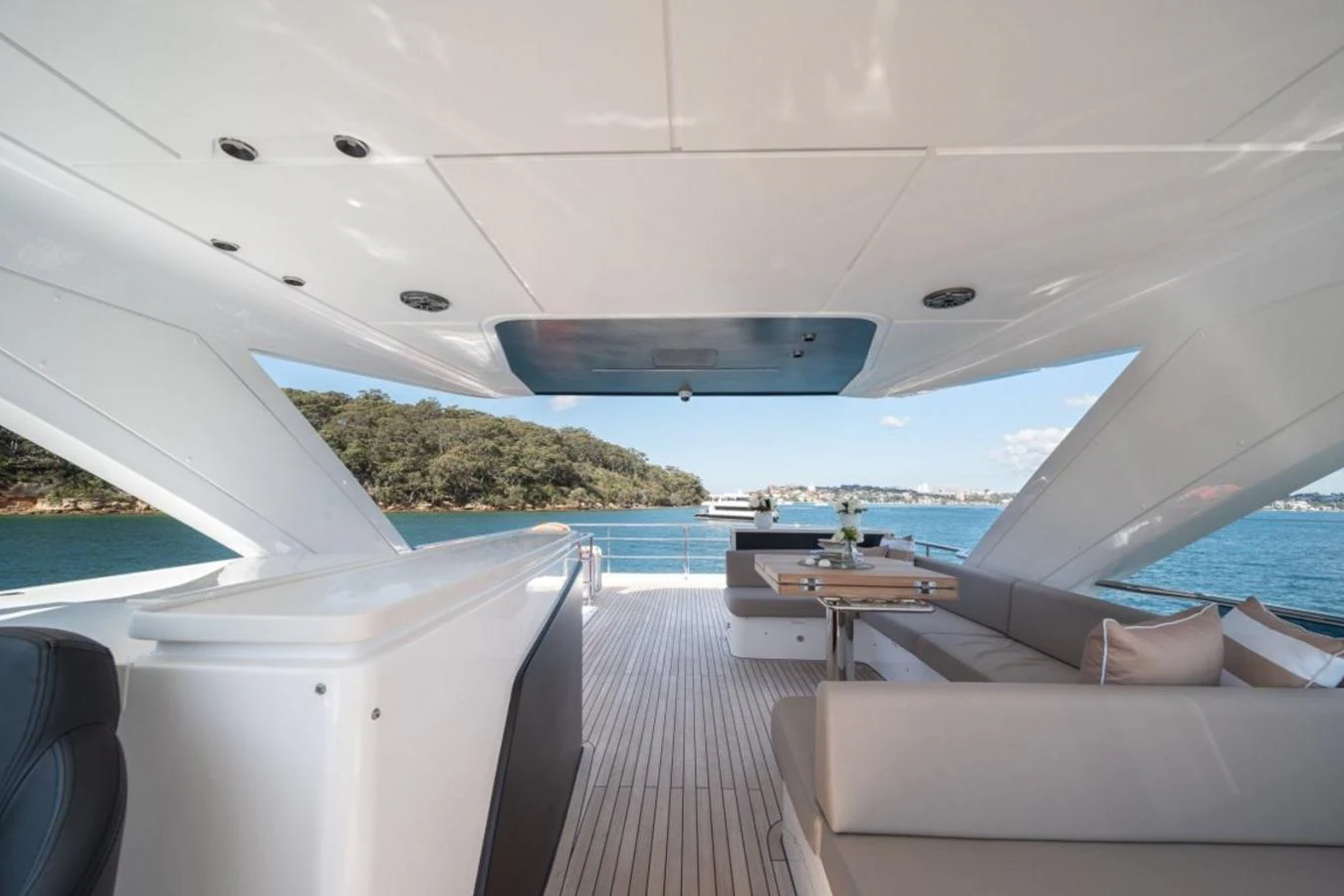 The aft deck offers a spacious and elegant outdoor area with comfortable seating and stunning views of the water. aboard TOPAZ Yacht for Sale