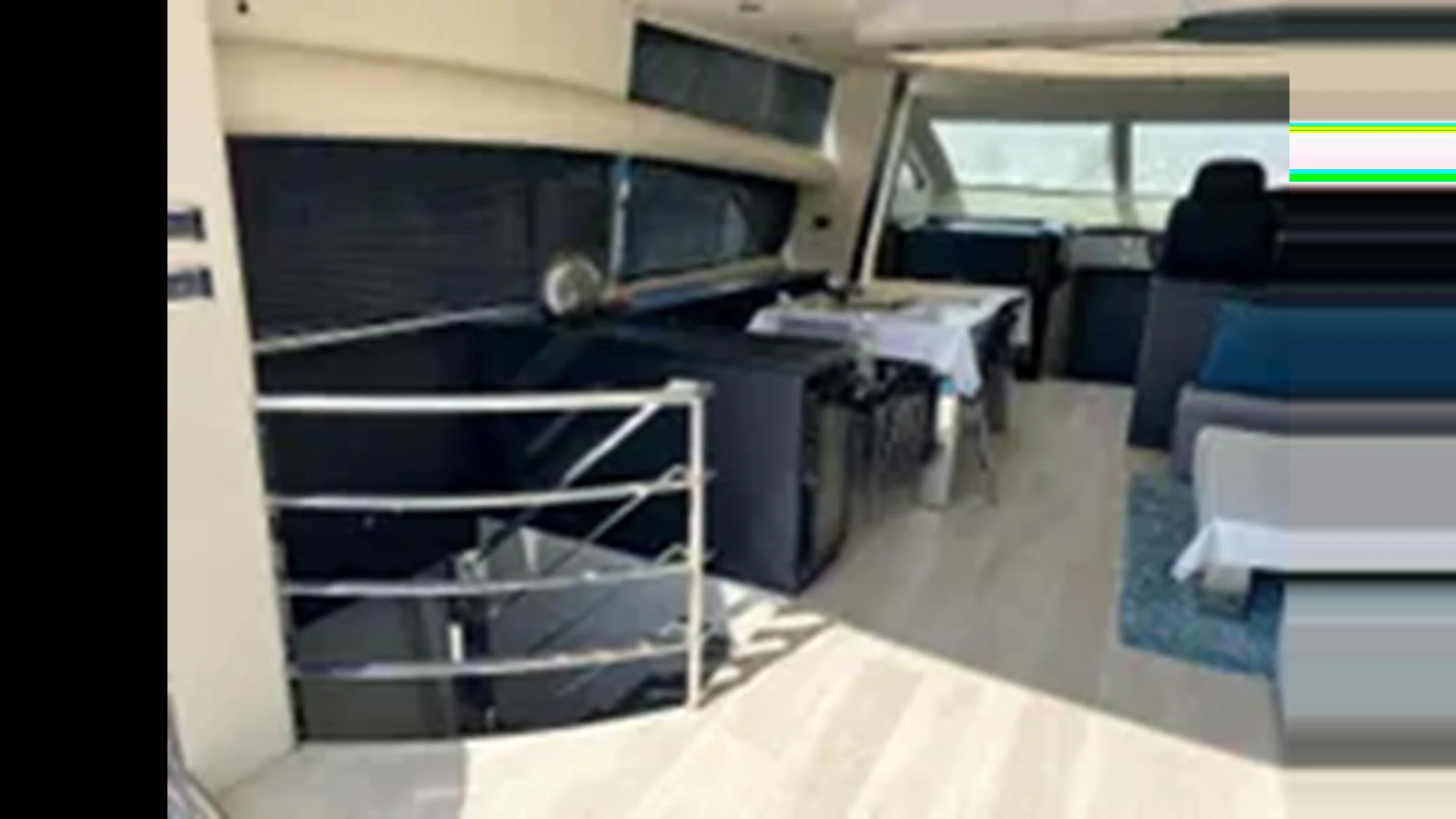 The yacht's interior features a modern, open-plan layout with ample natural light. aboard 2006 SUNSEEKER PREDATOR 82 Yacht for Sale