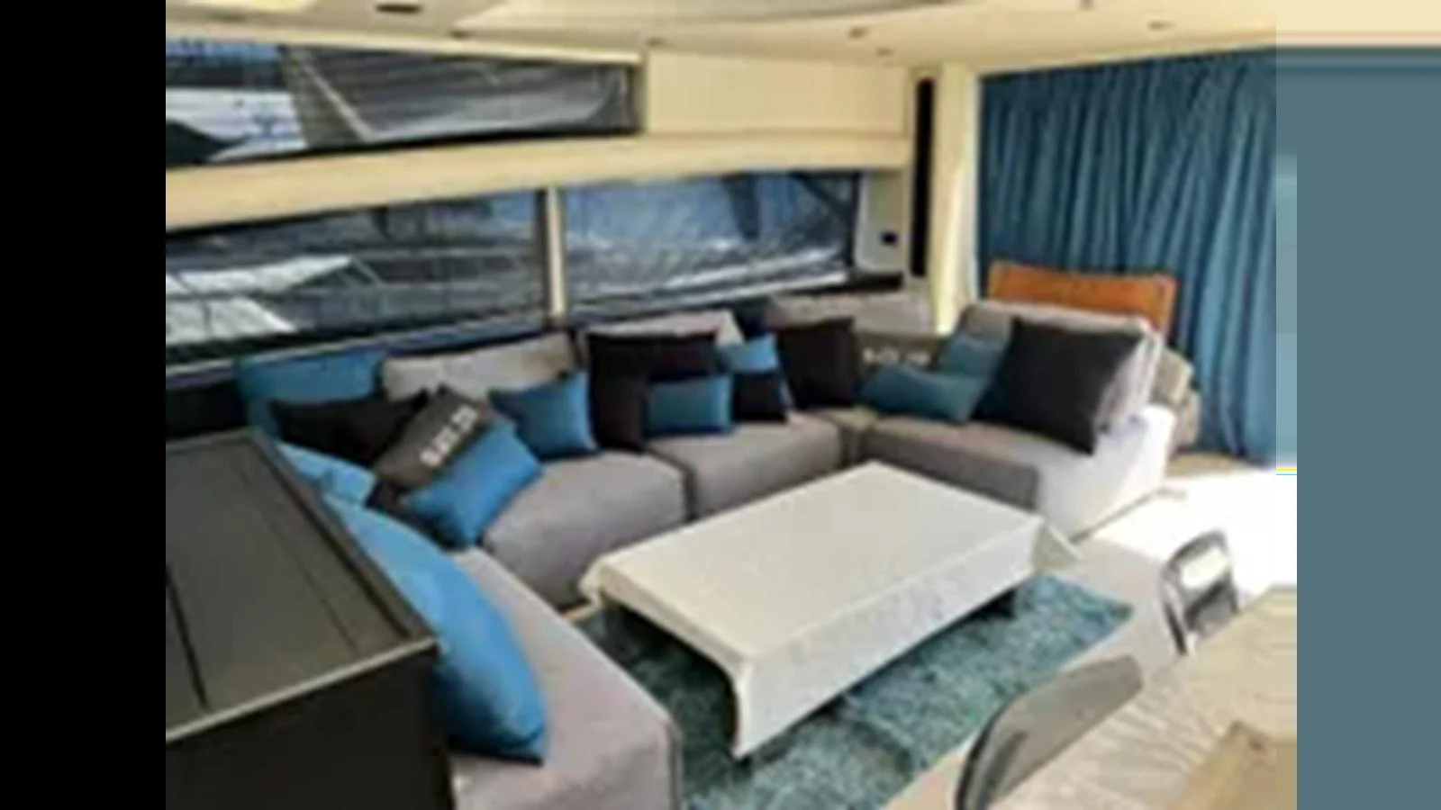 The yacht's salon features a spacious and comfortable seating area with a modern design. aboard 2006 SUNSEEKER PREDATOR 82 Yacht for Sale