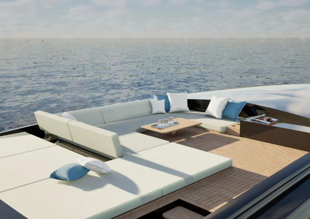 The sundeck features luxurious lounging areas with plush seating and a serene ocean backdrop. aboard NEW Yacht for Sale