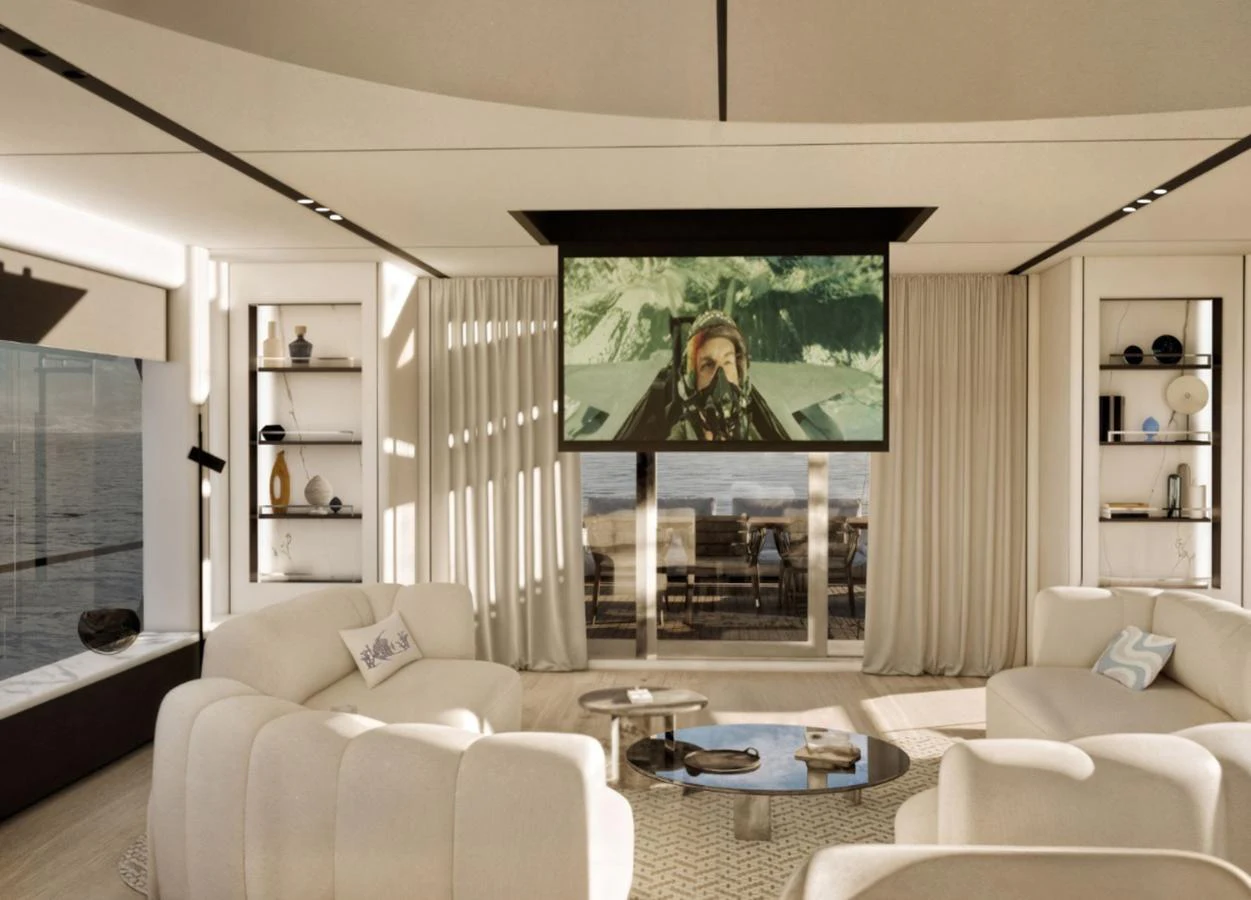 The salon features plush seating and a large screen for entertainment, creating a luxurious and comfortable atmosphere. aboard NEW Yacht for Sale